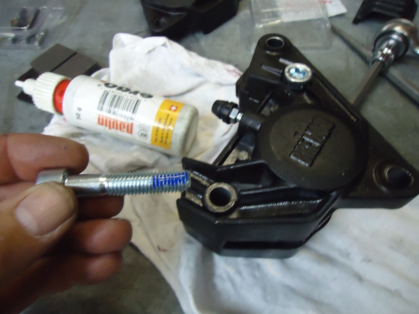 Brembo P08 caliper leak...a question (more leaks!).